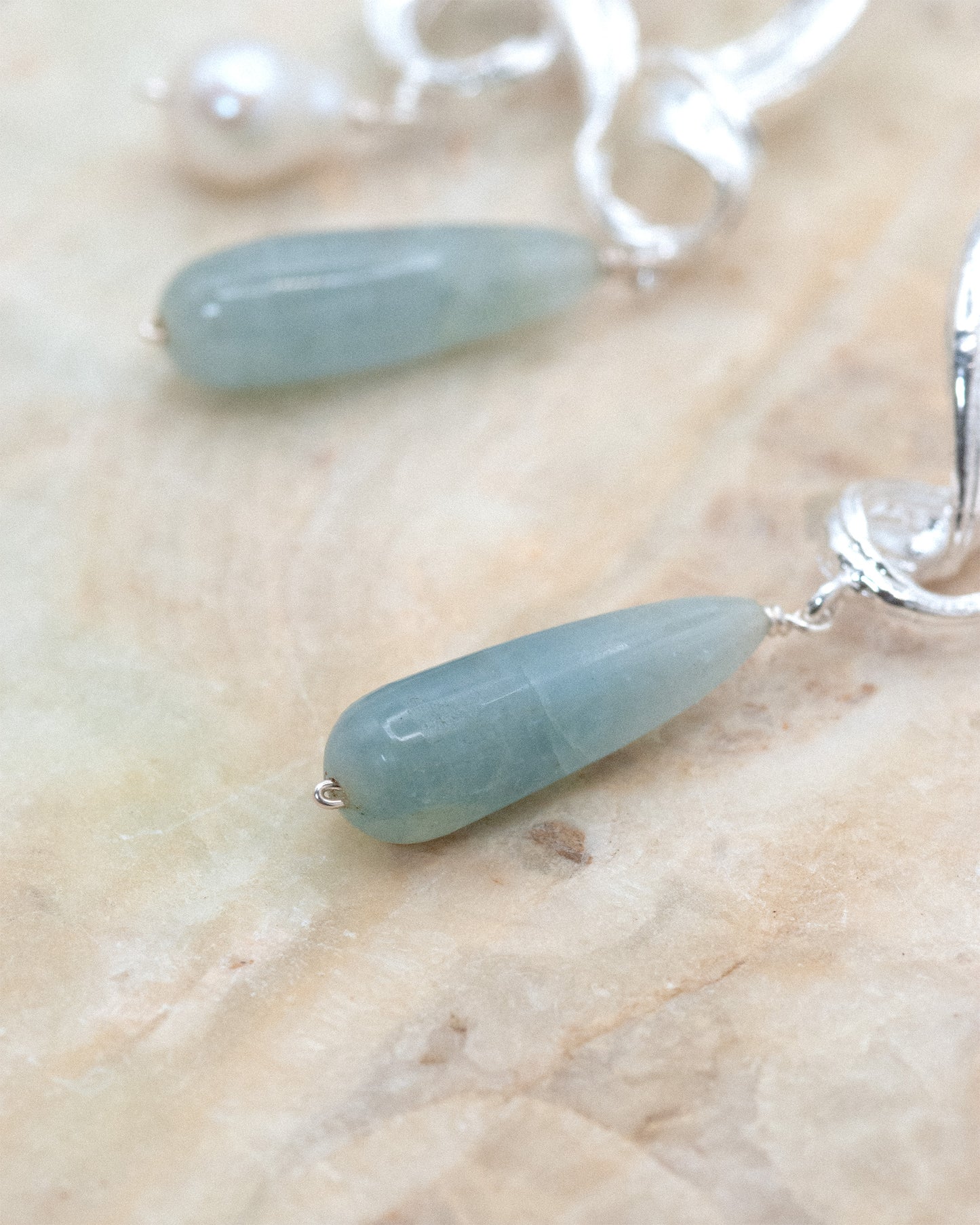 Oracle Earrings in Silver